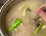 A picture of step 3 of Dried Squid Congee.