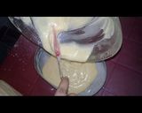 A picture of step 7 of Australian cake.. chocalate toping on vanilla cake.