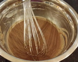 A picture of step 2 of Mocha Layer Cake with Whipped Mascarpone Cream and a Coffee Glaze Drizzle.