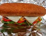 A picture of step 4 of Homemade Chicken Salami sandwich in Subway style.