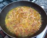 Foto del paso 8 de la receta: Arroz con azafrán y calamares