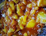 A picture of step 4 of Green tomato launji.