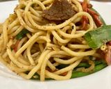 A picture of step 8 of Thai style beef noodles.