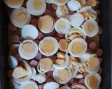 Tejszínes-sajtos rakott krumpli virslivel recept fázis 5 fotója