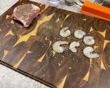 A picture of step 1 of Surf n’ Turf over Garlic Basil Fettuccine.