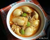 Foto langkah ke 6 dari resep Gulai Cumi Isi Tahu.