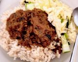 A picture of step 4 of Cinnamon-Coconut flavored local(ofada) rice with goat meat stew.