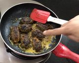 A picture of step 9 of Bharwa Karela.