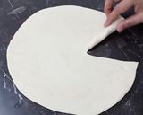 A picture of step 3 of Cone Style Paratha Folding.