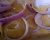 A picture of step 1 of Crispy onion rings pakorey.