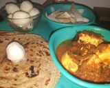 A picture of step 3 of Paneer masala with Parantha and white butter.