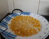 A picture of step 2 of Butter and Cheese corn pizza.