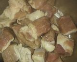 A picture of step 1 of Gajar methi gosht.