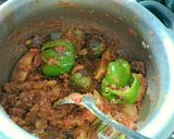 A picture of step 1 of Vangi shimla mirch masala bhaji.
