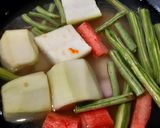 A picture of step 1 of Moong Dal with Veggies- Bottle Gourd,Drumsticks,Carrot & Beans.