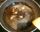Foto del paso 2 de la receta: Merluza al horno con refrito de ajos