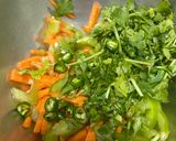A picture of step 1 of Carrot, capsicum with egg,cheese sandwich.