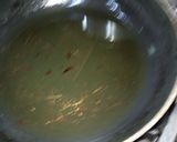 A picture of step 14 of Degi Chicken Haleem.