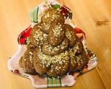 A picture of step 10 of Christmas cookies dipped in honey, aka melomakarona.