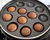 A picture of step 13 of Healthy Atta Jaggery Muffins in Appe Pan.