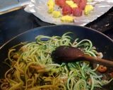 A picture of step 1 of Spiralised courgette with baby prawns, roast baby tomatoes and pineapple in chilli pesto.