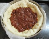 A picture of step 10 of Cheese Overflowing Chicago Pizza.