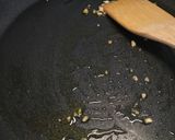 A picture of step 2 of Mezzi paccheri con calamari al cartoccio.