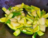 A picture of step 2 of Potato & Pointed Gourd Curry.