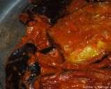 A picture of step 15 of Eggplatns onions with tomato sauce.