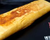 Une image de l'étape 15 de Tamagoyaki (omelette japonaise sucrée).