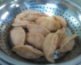 A picture of step 12 of Tomato egg momo.
