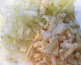 A picture of step 2 of Steamed Mochi Rice Dumplings with Pork and Bamboo Shoots in a Frying Pan.
