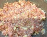 A picture of step 4 of Steamed Mochi Rice Dumplings with Pork and Bamboo Shoots in a Frying Pan.