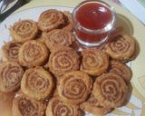 A picture of step 9 of Pinwheel Chicken Bites.