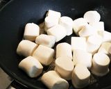 A picture of step 3 of Rice Krispie Treats with Hardtack.