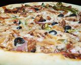 A picture of step 6 of Chicken fajita pizza.