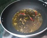 A picture of step 1 of Hilsa haldi pani.