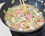 A picture of step 6 of Crispy Nagasaki Sara Udon.