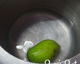 A picture of step 1 of Hyderabadi Aab Shola with Coconut Jaggery.