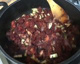 Une image de l'étape 13 de Dahl de lentilles jaunes aux carottes violettes, tomates et courgette.