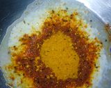 A picture of step 1 of Chicken Tikka with white rice.