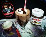 A picture of step 6 of Bourbon-Nutella Icecream Shake.