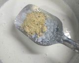 A picture of step 2 of Condensed milk firni.
