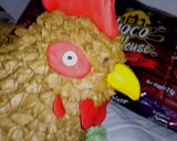A picture of step 4 of Bird theme cake.