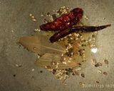 A picture of step 7 of Assamese bilahi boror tenga (Sour Curry with Red Lentil Fritter).