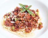 A picture of step 5 of Spaghetti bolognese with Thai green pesto.
