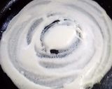 A picture of step 3 of Shezwan masala cheese Dosa roll.