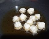 A picture of step 5 of Phulkopi,aloo diye Chhanar Dalna.
