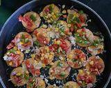 A picture of step 2 of Biscuit pizza.
