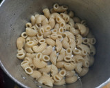 Foto del paso 3 de la receta: Fideos coditos con albahaca